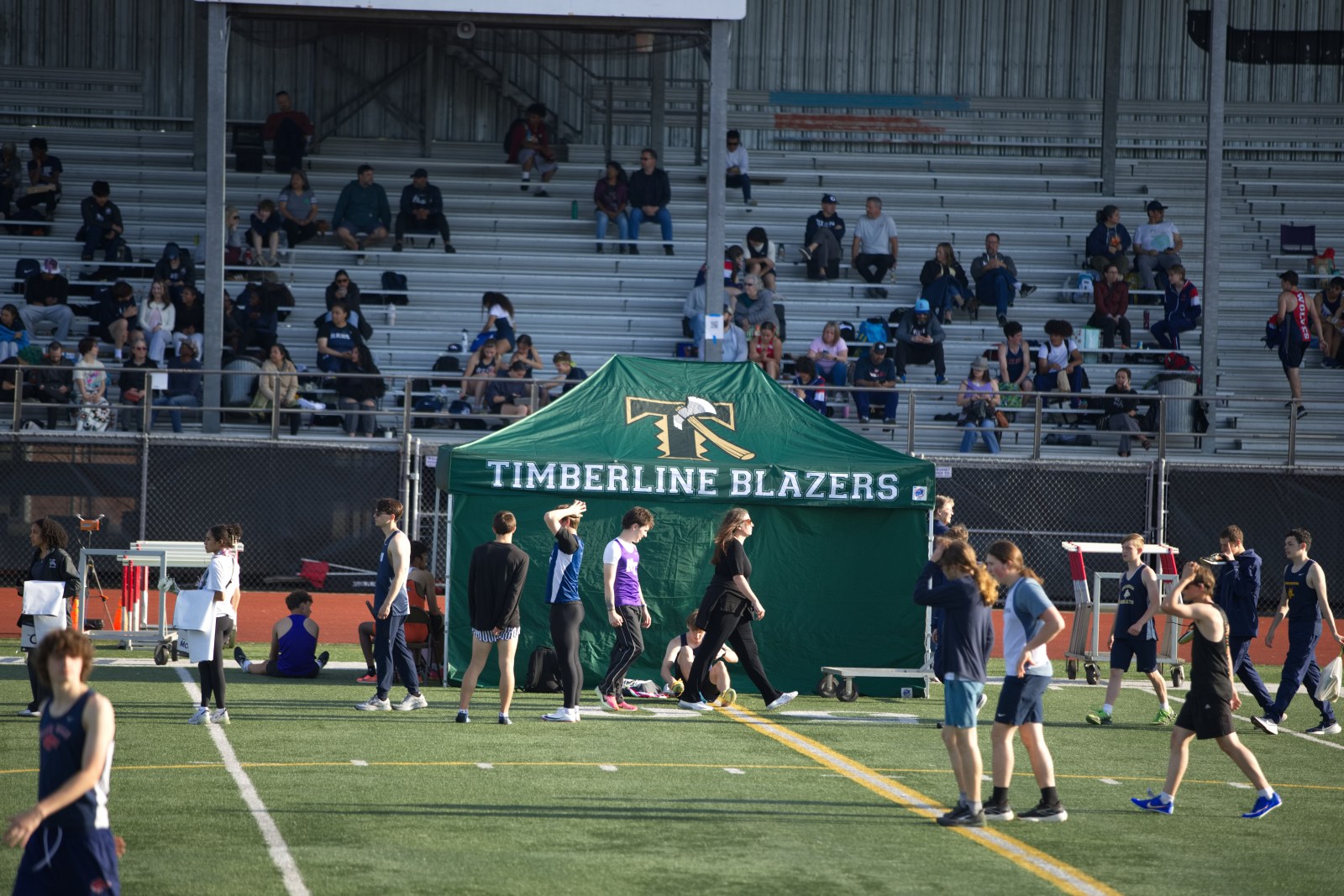 Timberline Blazers tent on the field at a track meet